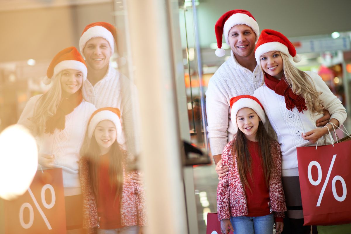 A family purchasing discounted Christmas presents.