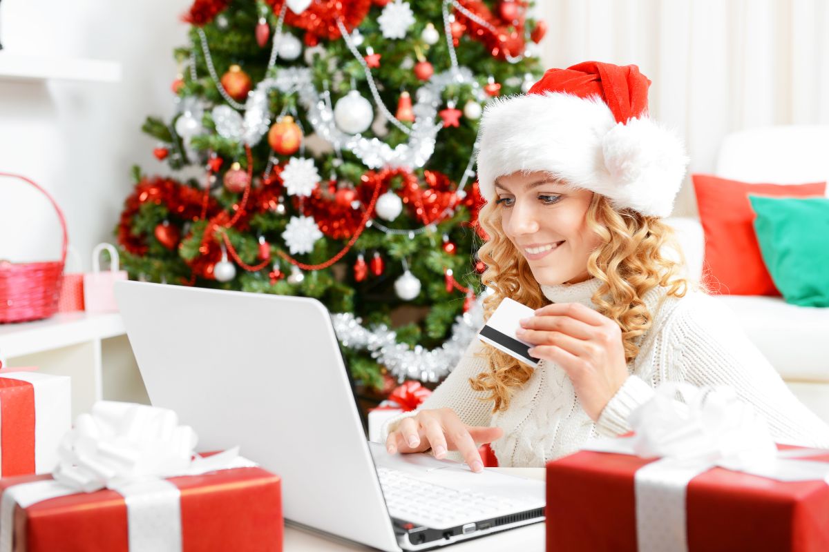 A lady buying Christmas gift items online.