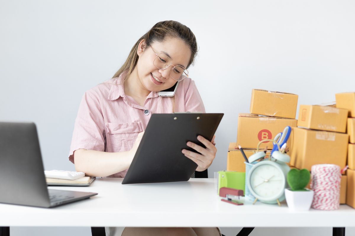 A lady is happy after using cross selling method.