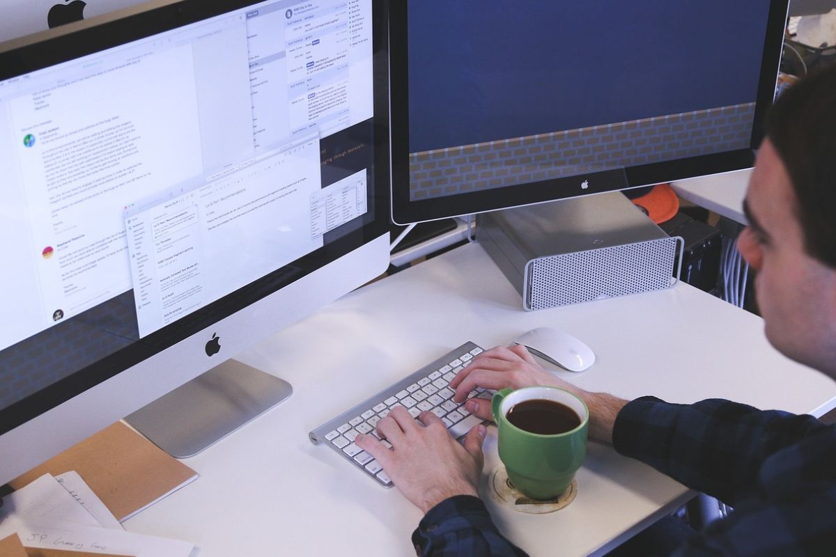 A man doing research for marketing his print on demand unique products.