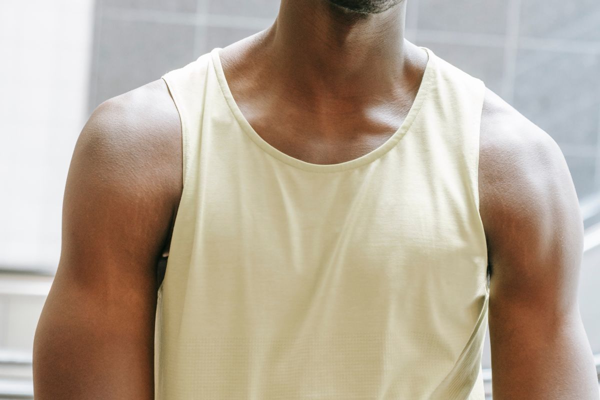 A man wearing fitness tank top