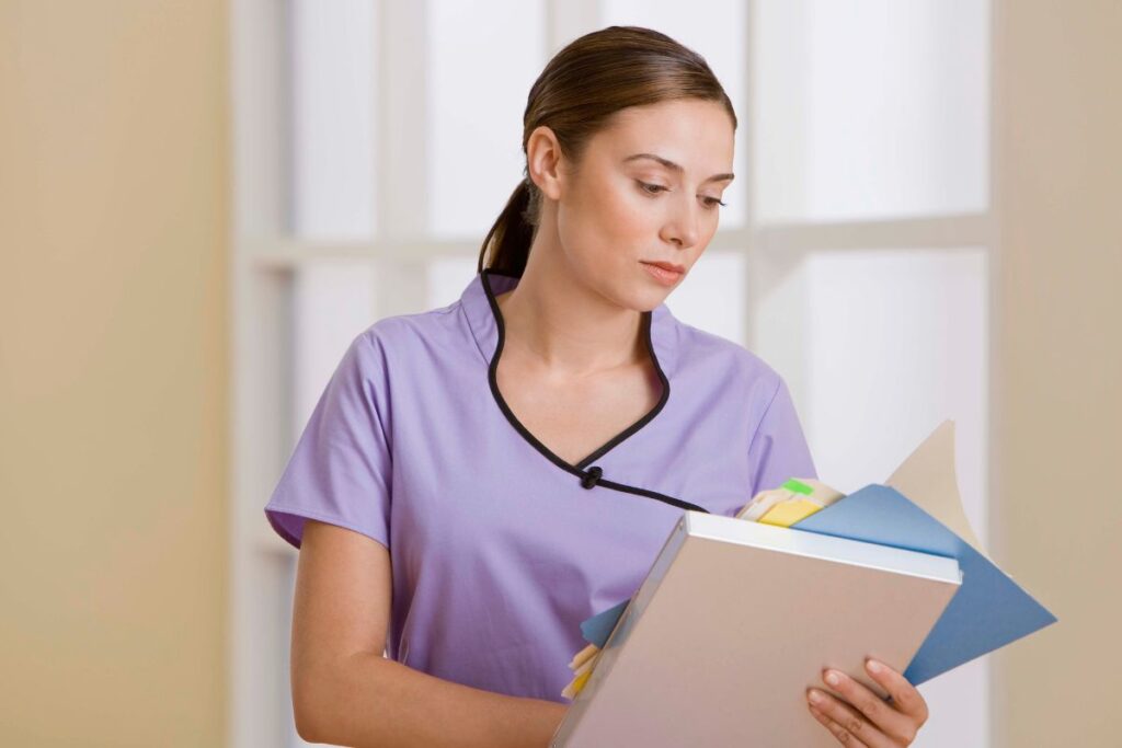 A nurse with her notebook, which she received as a Christmas present.