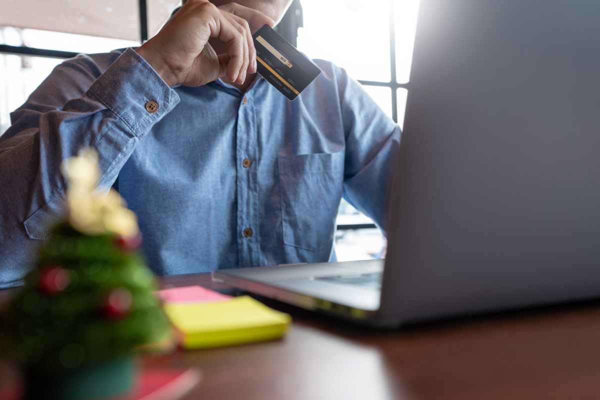 A person buying handcrafted gifts online to delight his teachers.