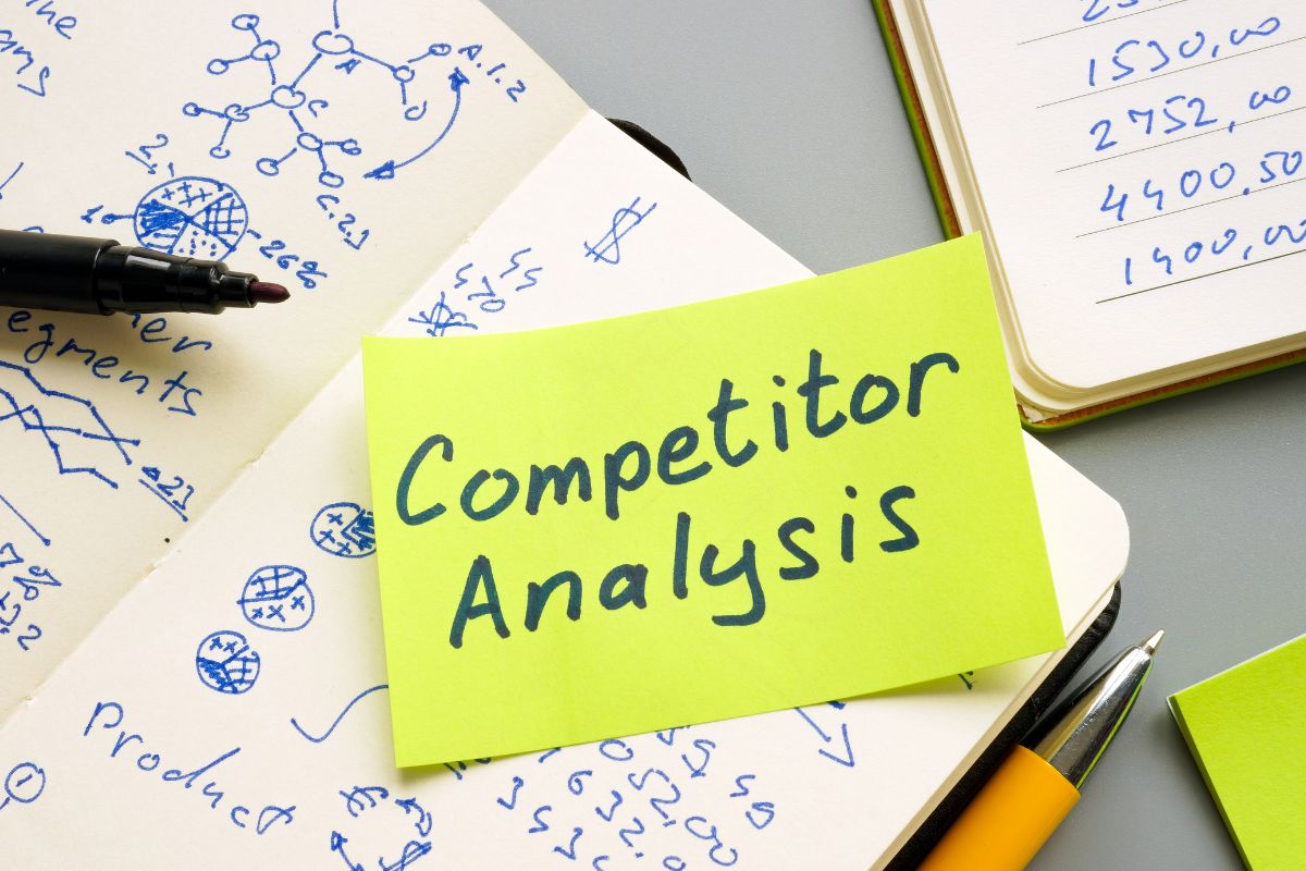 A person doing competitor analysis by using different strategy.