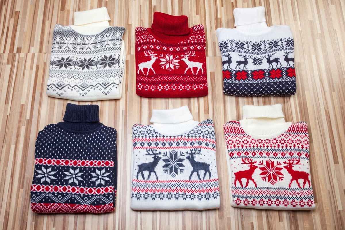 Different  Christmas sweaters are kept together for students.