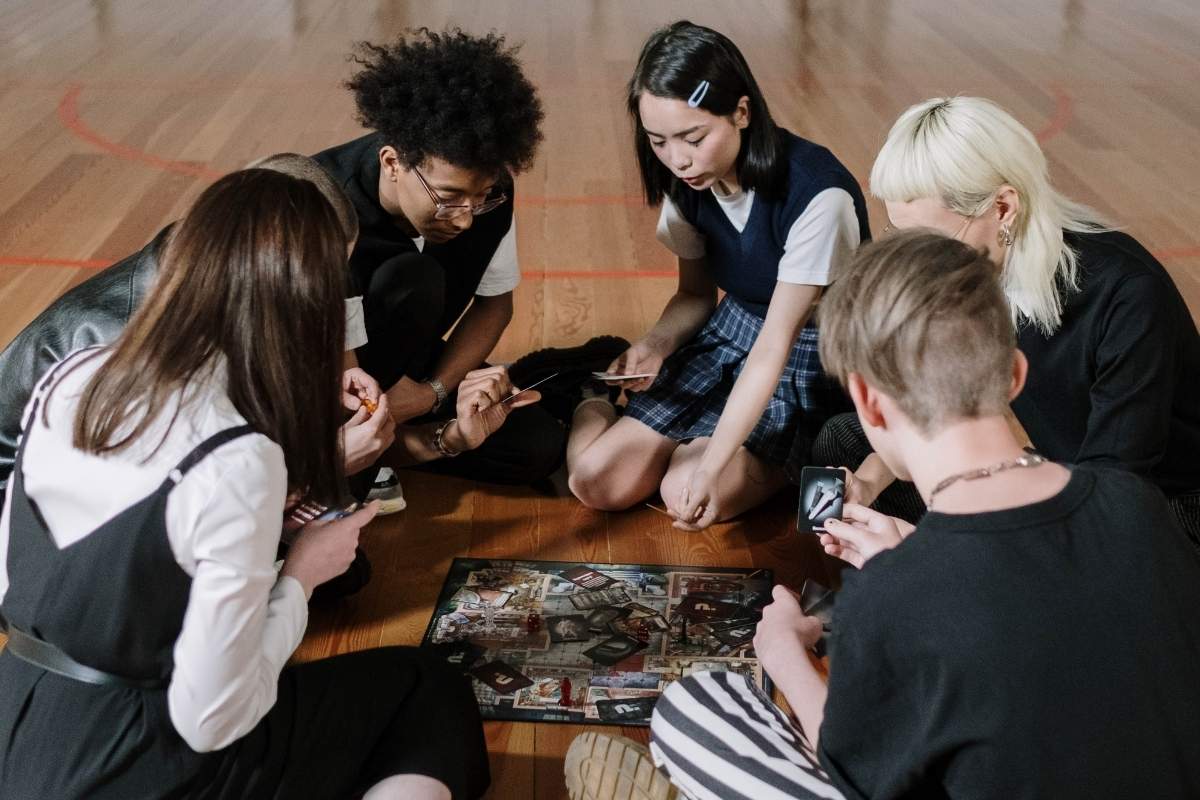 Student playing board games that they received as a christmas gift.