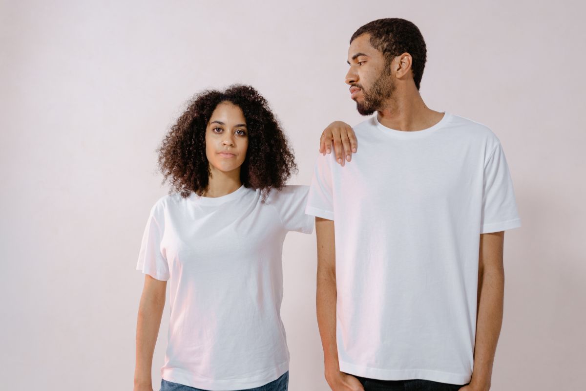 A lady and a man wearing t-shirt made from recycled material