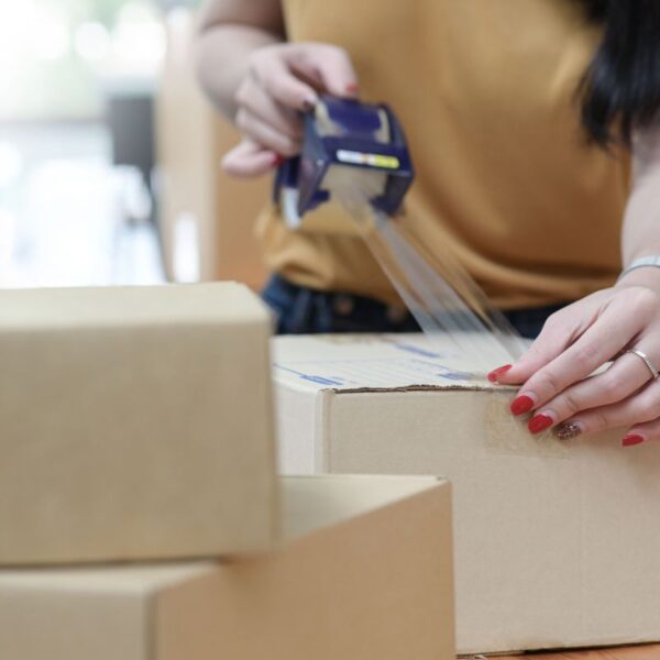 A lady packing her products to sell them on best online marketplaces online