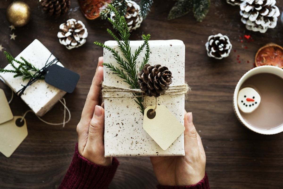 A lady showing her eco-friendly christmas gift