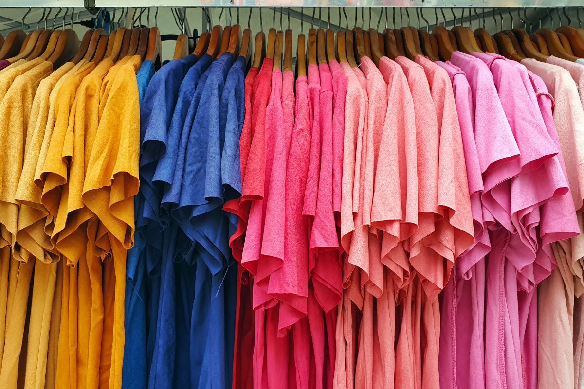 Different colored dye t-shirt kept at a store