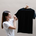 A lady flaunting her latest T-shirt for her Instagram T-shirt business