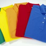 A collection of custom embroidered polo shirt kept with each other