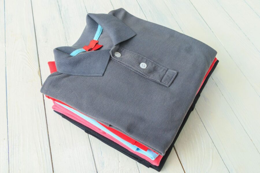 A collection of custom printed polo T-shirts placed together