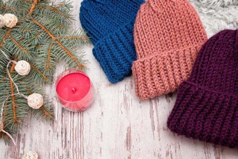 A collection of different colored custom knit beanie
