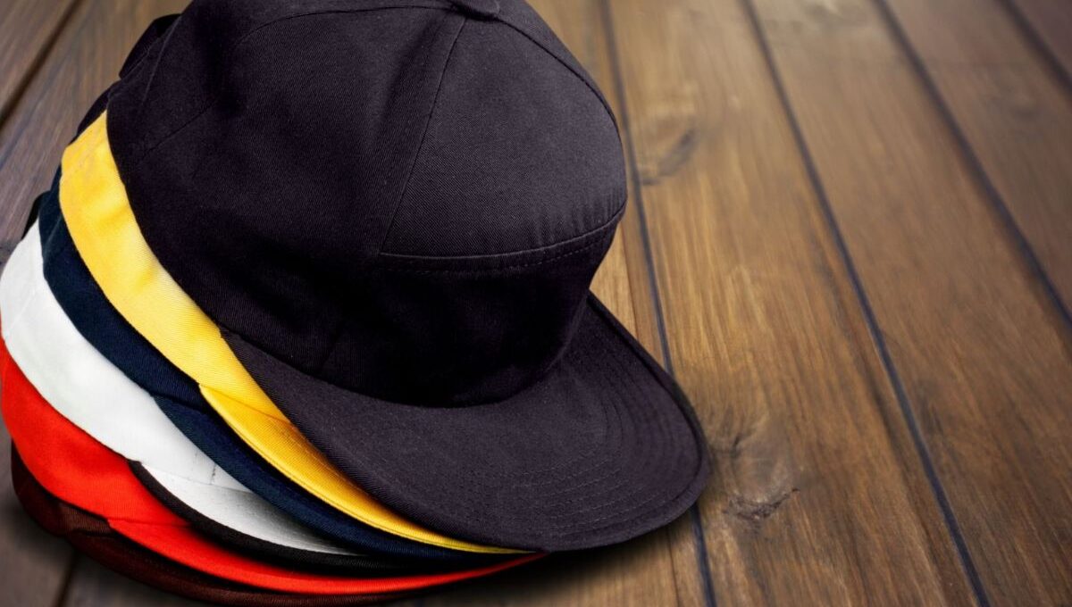 A collection of personalized flat bill hat kept together