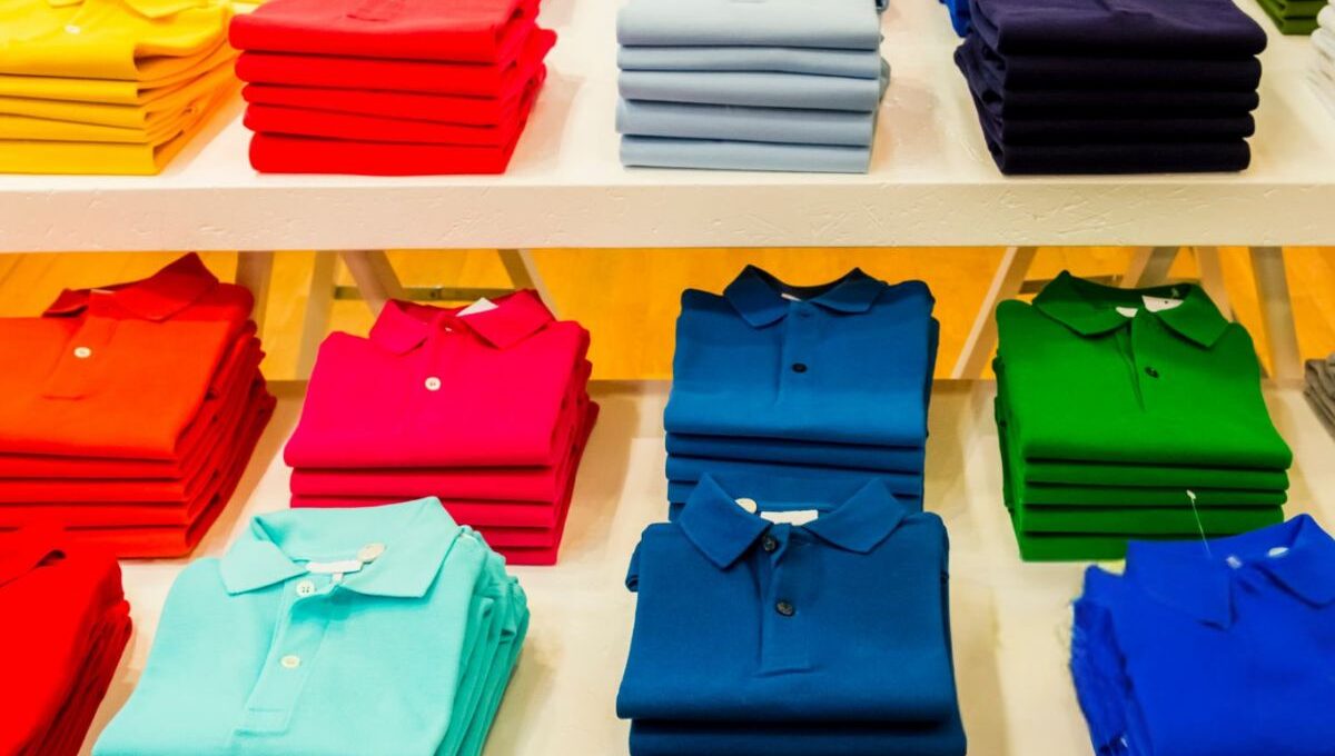 A collection of personalized polo shirt for business kept at a store for sale