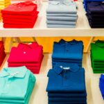 A collection of personalized polo shirt for business kept at a store for sale
