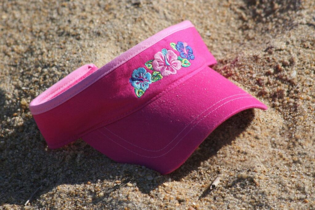 A customized visor is kept on the beach