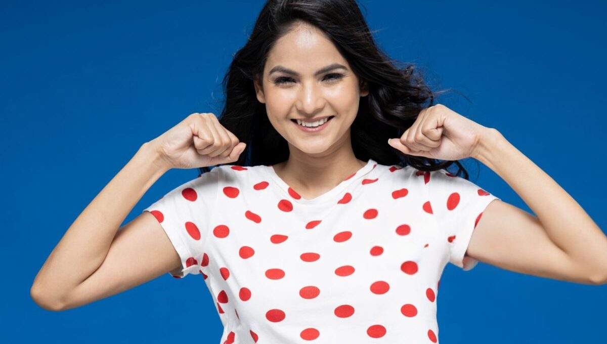 A lady wearing custom printed crop top t-shirt