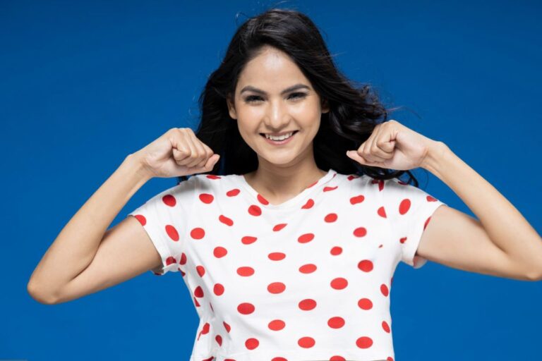 A lady wearing custom printed crop top t-shirt