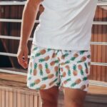 A person wearing printed Men's Athletic Shorts