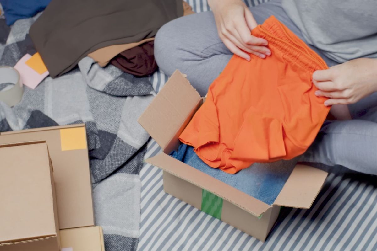 A woman checking her shorts that she bought online