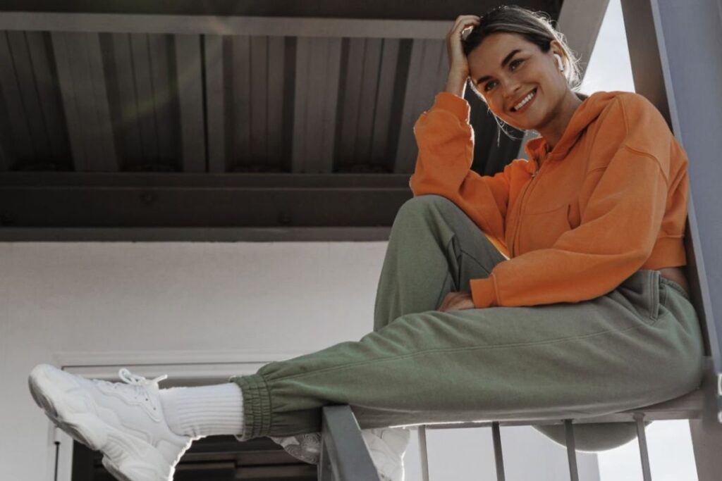 A woman wearing custom printed sweatpants