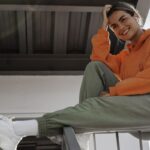 A woman wearing custom printed sweatpants