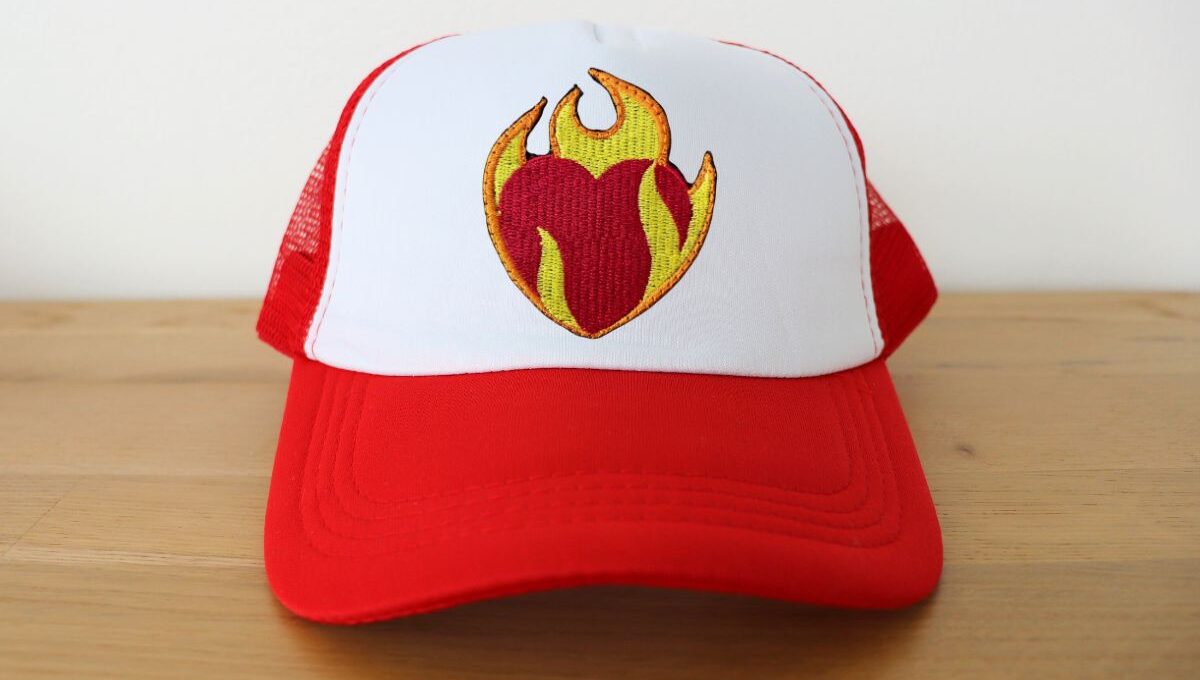 Embroidered trucker hat kept on a table