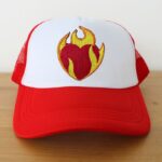 Embroidered trucker hat kept on a table