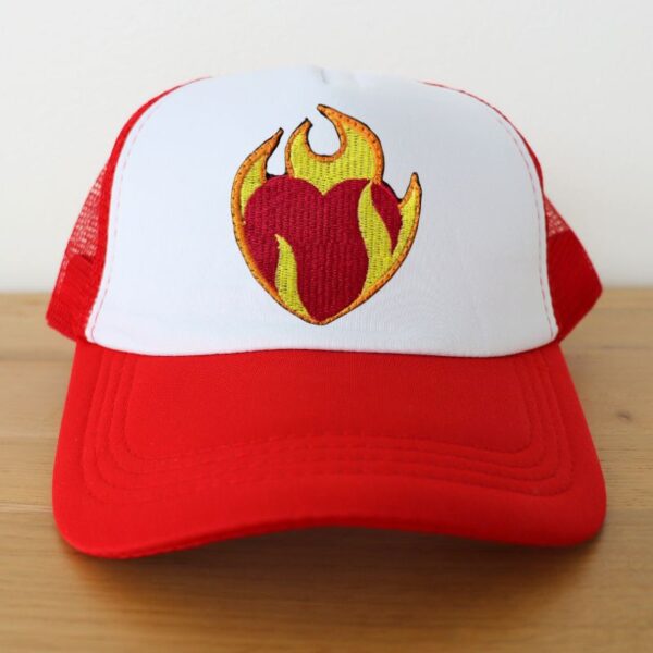 Embroidered trucker hat kept on a table