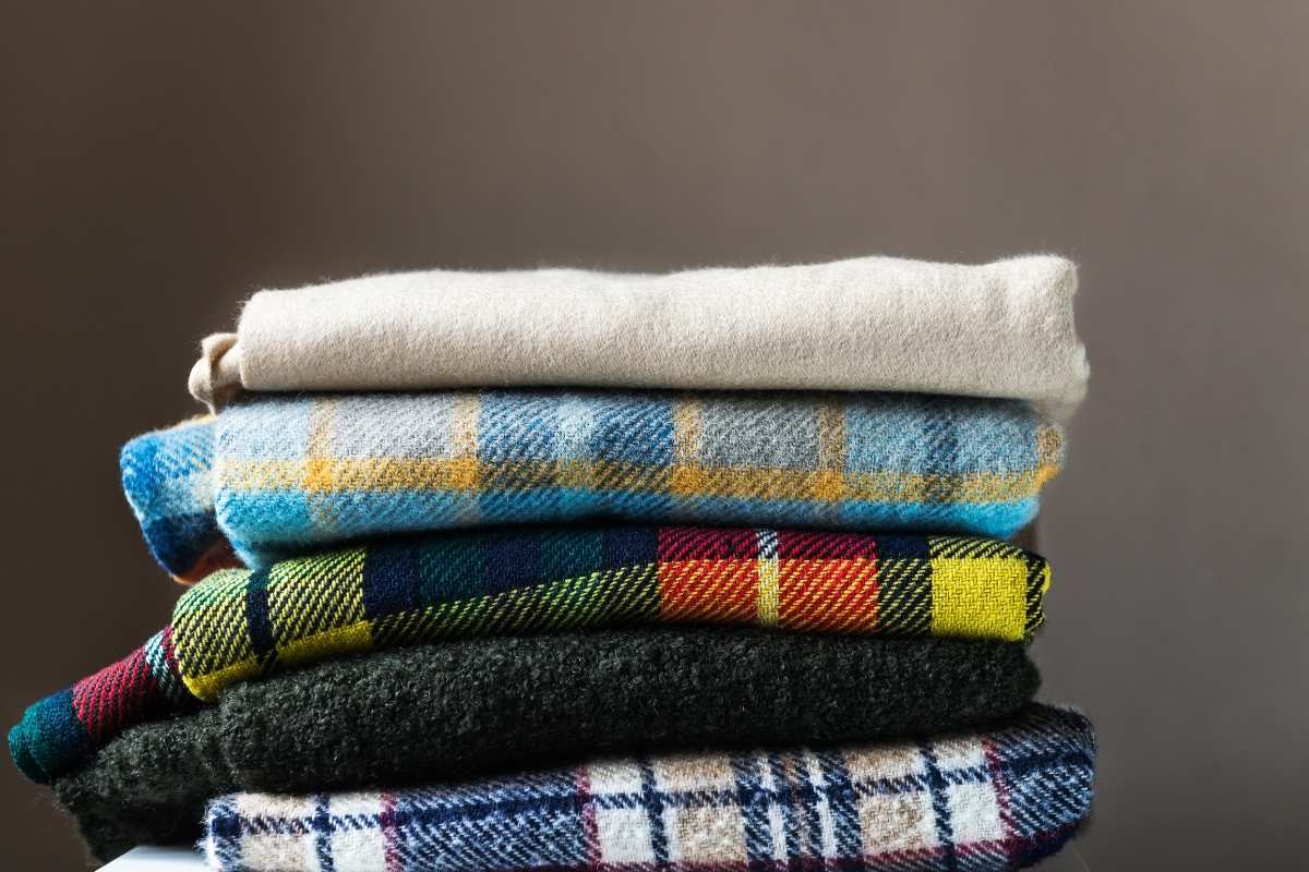 A collection of custom fleece blankets arranged together
