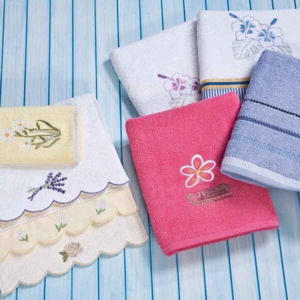 A collection of embroidered hand towel kept with each other