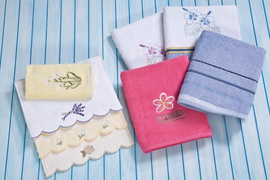 A collection of embroidered hand towel kept with each other