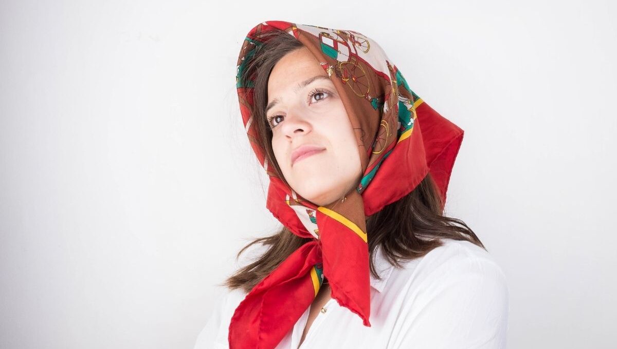 A lady wearing a personalized headscarf