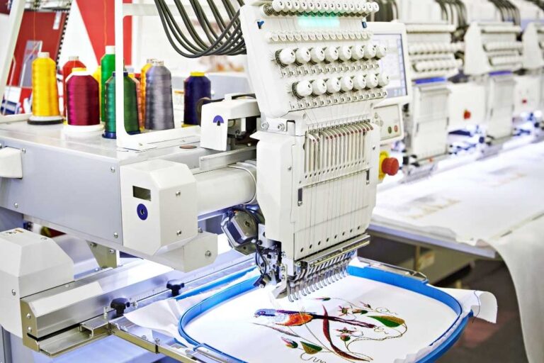A machine embroidering a bandana
