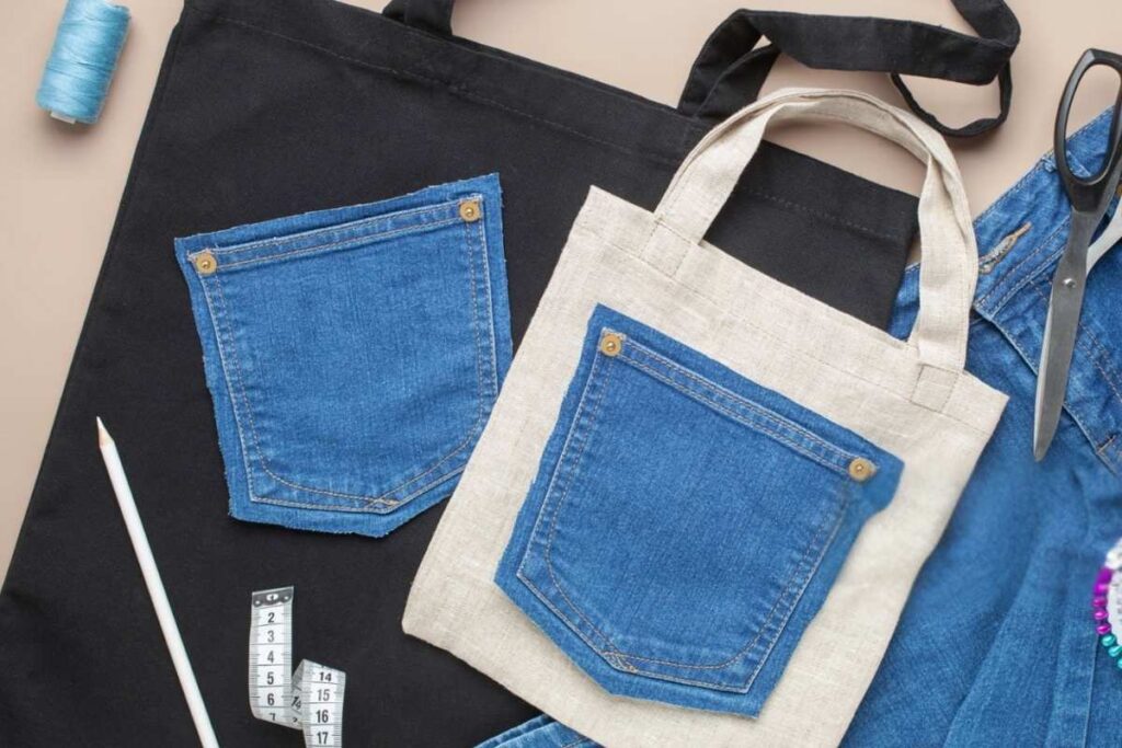 A person is customizing a tote bag