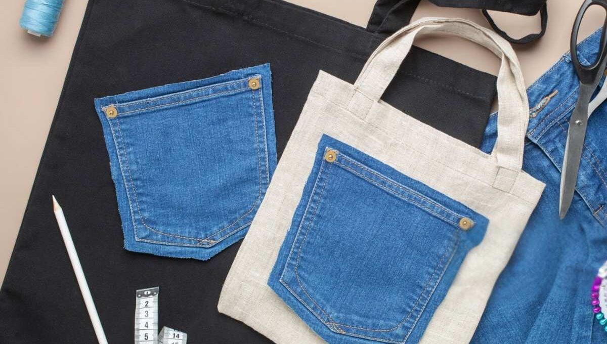 A person is customizing a tote bag