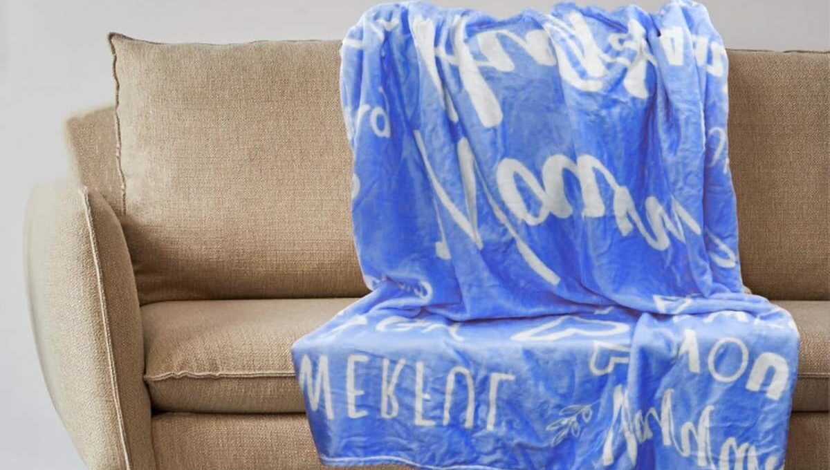 A personalized blanket kept on a sofa
