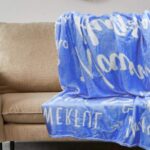 A personalized blanket kept on a sofa