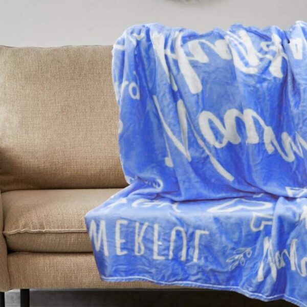 A personalized blanket kept on a sofa