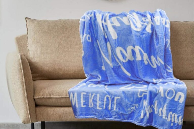 A personalized blanket kept on a sofa