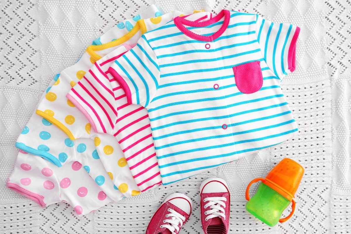 A collection of baby boy clothes kept with each other
