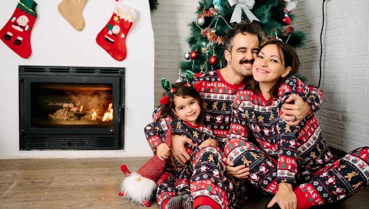 A family member wearing matching family outfits