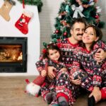 A family member wearing matching family outfits