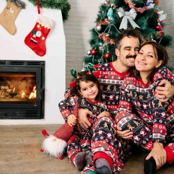A family member wearing matching family outfits