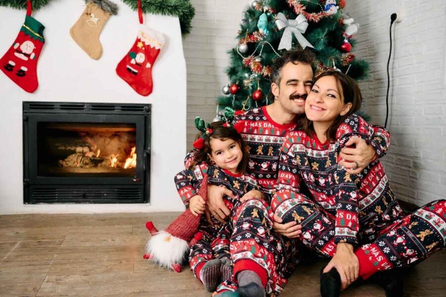 A family member wearing matching family outfits