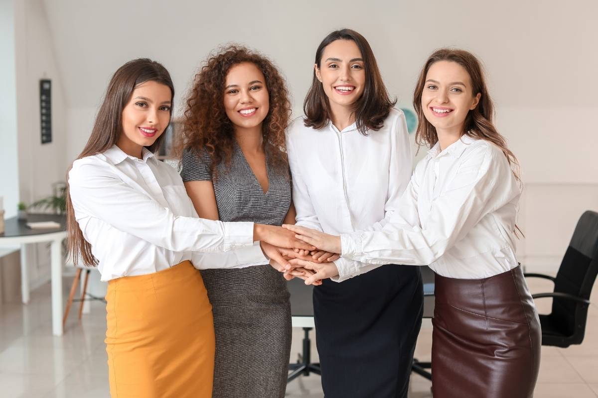 A group of women in office-ready clothes