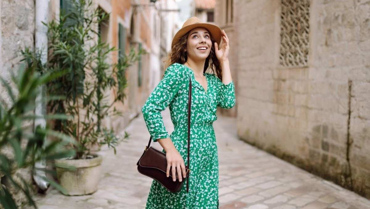 A lady wearing a long maxi dress