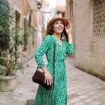 A lady wearing a long maxi dress
